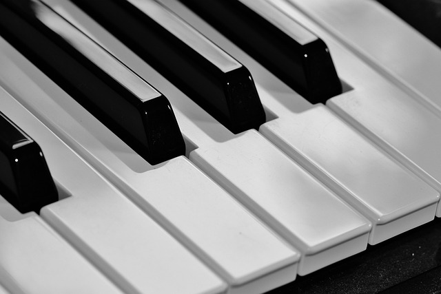 piano keyboard close-up with warm lighting in a music studio