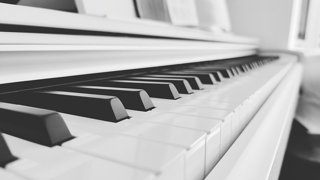 pianist performing at a piano recital with focused expression